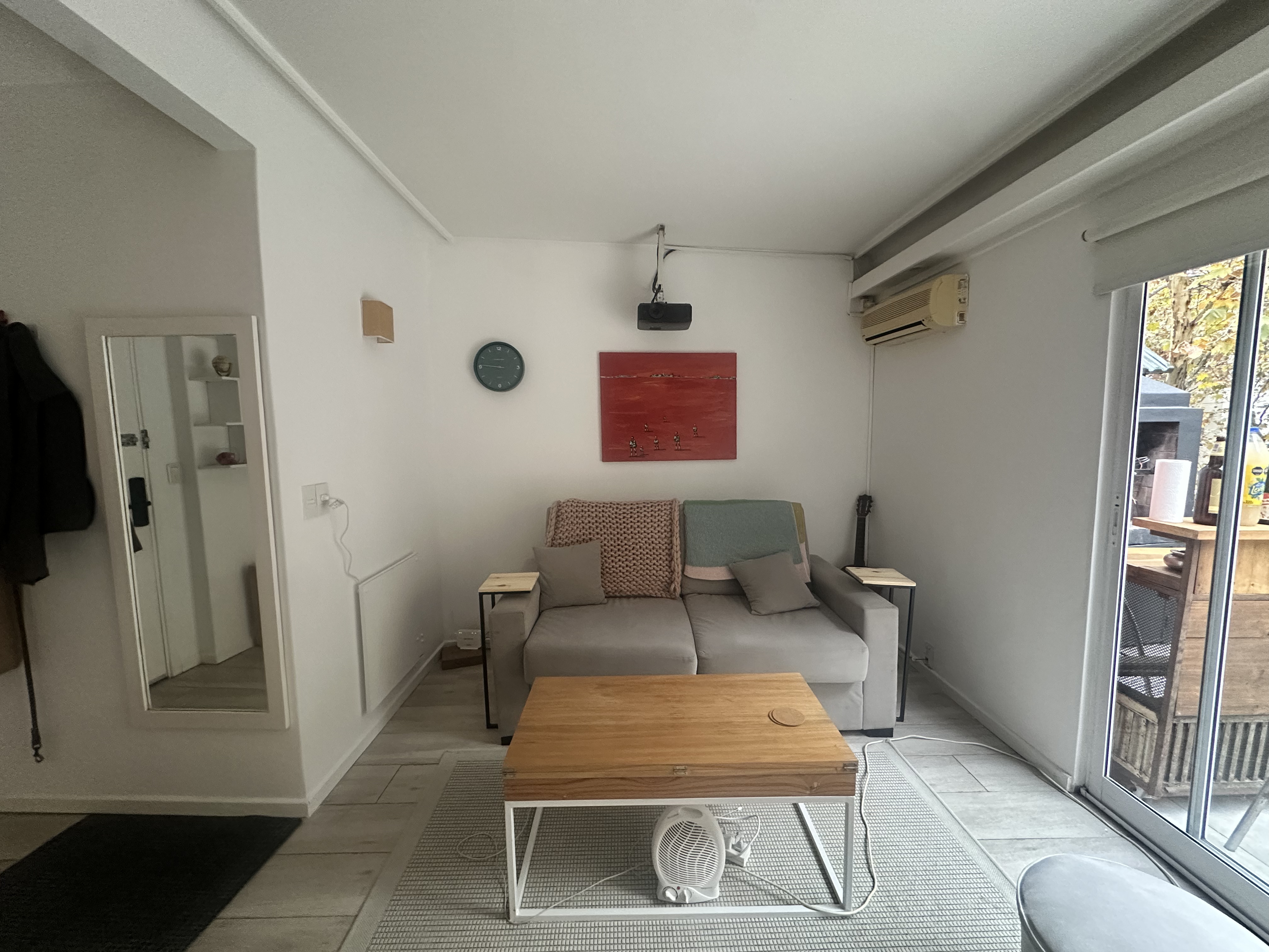Living room with linen sofa and oak floors